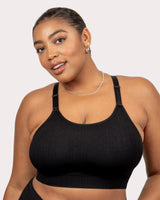 Black longline wireless bra with smooth seamless front and thin adjustable straps