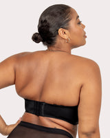 Back view of black strapless push-up bra with wide adjustable band