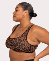 Leopard print sheer bralette on model, racerback style with wide underband