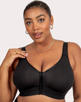 Black wireless bra with front hook-and-eye closure and smooth molded cups