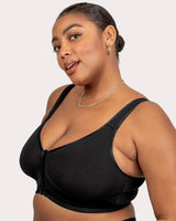 Black wireless bra with deep scoop neckline, wide straps, and front hook closure